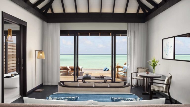 Anantara-Veli-Deluxe-Over-Water-Villa-Bedroom-with-lagoon-views